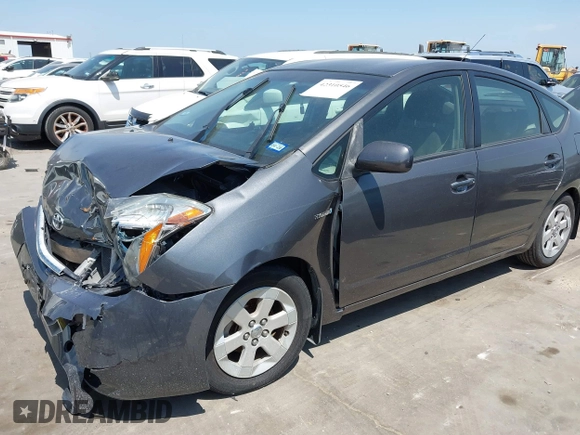 2007 Toyota Prius z VIN JTDKB20U173242693, wystawiony jako IAAI lot #42310546 z przebiegiem 250 887 mil mil oraz . Historia ofert i sprzedaży dostępna na DreamBid. Obrazek 17.