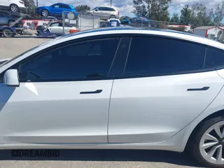 2023 Tesla Model 3 z VIN 5YJ3E1EA3PF451392, wystawiony jako IAAI lot #41668299 z przebiegiem 77 915 mil mil oraz . Historia ofert i sprzedaży dostępna na DreamBid. Obrazek 13.