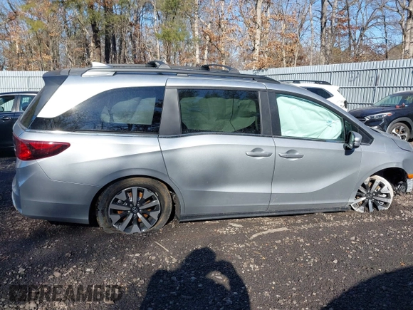 2025 Honda Odyssey EX-L with VIN 5FNRL6H64SB016104, listed as a IAAI auction lot 41456550 with 61 mi miles and . Bid and sale history available at DreamBid. Image 13.