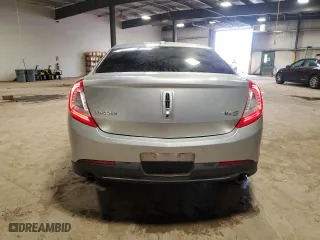 2013 Lincoln MKS with VIN 1LNHL9DK9DG605525, listed as a Copart auction lot 49406685 with 117757 miles and Salvage Title. Bid and sale history available at carsss.com. Image 6.