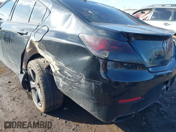 2013 Acura TL Technology z VIN 19UUA9F59DA000912, wystawiony jako IAAI lot #41533865 z przebiegiem 164 690 mil mil oraz . Historia ofert i sprzedaży dostępna na DreamBid. Obrazek 17.