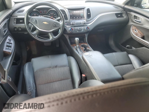 2015 Chevrolet Impala LT z VIN 1G1125S38FU144215, wystawiony jako Copart lot #57964915 z przebiegiem 125 922 mil mil oraz Szkoda całkowita • Salvage title. Historia ofert i sprzedaży dostępna na DreamBid. Obrazek 8.