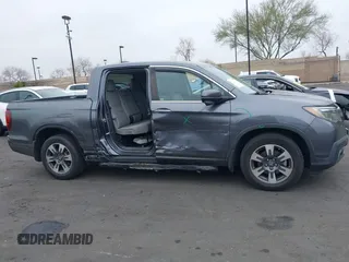 2017 Honda Ridgeline RTL-T with VIN 5FPYK2F67HB002854, listed as a IAAI auction lot 41895895 with 86,882 mi miles and . Bid and sale history available at DreamBid. Image 14.