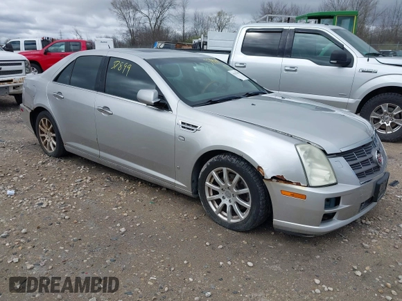 2008 Cadillac STS RWD w/1SB with VIN 1G6DW67V080126989, listed as a IAAI auction lot 42137899 with 123,638 mi miles. Bid and sale history available at carsss.com. Image 1.