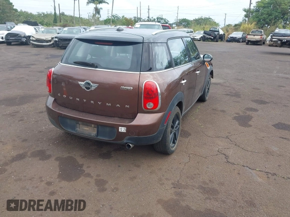 2014 MINI Countryman with VIN WMWZB3C51EWR36737, listed as a IAAI auction lot 41741248 with 69,717 mi miles and . Bid and sale history available at DreamBid. Image 4.
