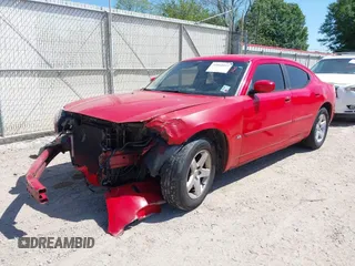 2010 Dodge Charger SXT with VIN 2B3CA3CV8AH165800, listed as a IAAI auction lot 42010412 with 180,311 mi miles. Bid and sale history available at carsss.com. Image 2.