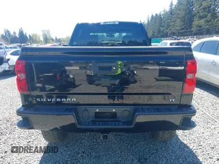 2018 Chevrolet Silverado 1500 LT with VIN 3GCUKREC7JG544365, listed as a IAAI auction lot 42055441 with 57,832 mi miles. Bid and sale history available at carsss.com. Image 16.