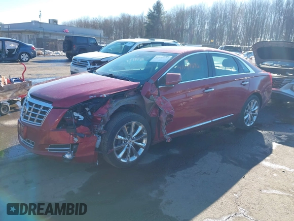 2014 Cadillac XTS Luxury z VIN 2G61N5S34E9163874, wystawiony jako IAAI lot #41649292 z przebiegiem 104 638 mil mil oraz . Historia ofert i sprzedaży dostępna na DreamBid. Obrazek 17.