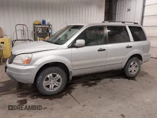 2005 Honda Pilot EX-L with VIN 2HKYF18575H557005, listed as a IAAI auction lot 41647830 with 245,992 mi miles. Bid and sale history available at carsss.com. Image 2.