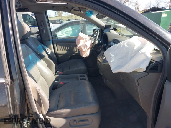 2010 Honda Odyssey EX-L with VIN 5FNRL3H67AB063205, listed as a IAAI auction lot 41996537 with 146,327 mi miles and . Bid and sale history available at DreamBid. Image 5.