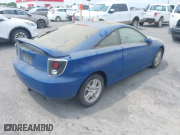 2001 Toyota Celica GT with VIN JTDDR32T810098020, listed as a IAAI auction lot 42133208 with 233,085 mi miles. Bid and sale history available at carsss.com. Image 4.
