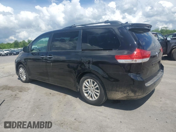 2011 Toyota Sienna XLE AAS with VIN 5TDYK3DC3BS106218, listed as a Copart auction lot 55977105 with 279,622 mi miles and Clean Title. Bid and sale history available at DreamBid. Image 2.