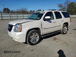2013 GMC Yukon SLT with VIN 1GKS1CE05DR259086, listed as a Copart auction lot 42103305 with 130,079 mi miles and Salvage Title. Bid and sale history available at carsss.com. Image 1.