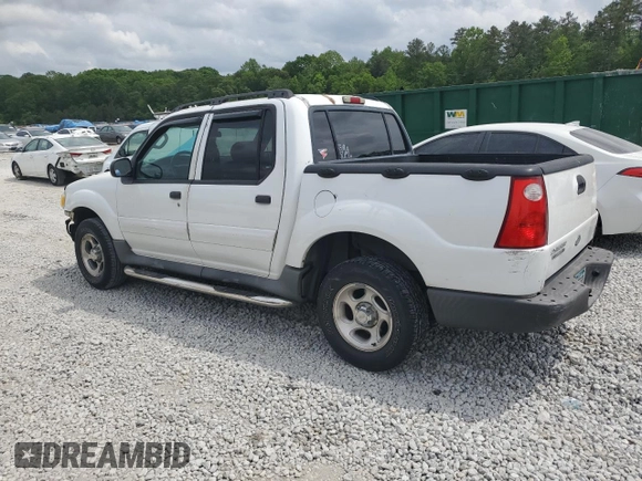 2005 Ford Explorer Sport Trac XLS with VIN 1FMZU67K85UA59170, listed as a Copart auction lot 54472775 with 227,225 mi miles and Salvage title. Bid and sale history available at DreamBid. Image 2.