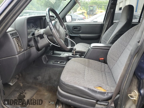 1999 Jeep Cherokee Sport с VIN 1J4FT68S6XL586023, выставлен на аукционе Copart как лот 58907195 с пробегом 391 932 миль миль и Списание • Salvage title. История ставок и продаж доступна на DreamBid. Изображение 7.