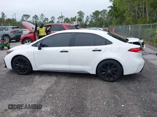 2021 Toyota Corolla SE with VIN 5YFS4MCE9MP075707, listed as a IAAI auction lot 41409994 with 39,544 mi miles. Bid and sale history available at carsss.com. Image 15.