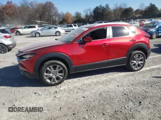 2022 Mazda CX-30 S Select with VIN 3MVDMBBL4NM415818, listed as a Copart auction lot 82580634 with 57,136 mi miles and Salvage title. Bid and sale history available at DreamBid. Image 1.