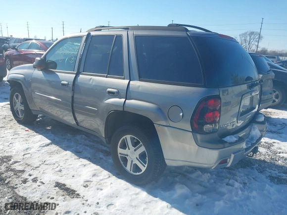 2005 Chevrolet TrailBlazer LT with VIN 1GNDT13S152213571, listed as a IAAI auction lot 41356058 with 157,856 mi miles. Bid and sale history available at carsss.com. Image 3.