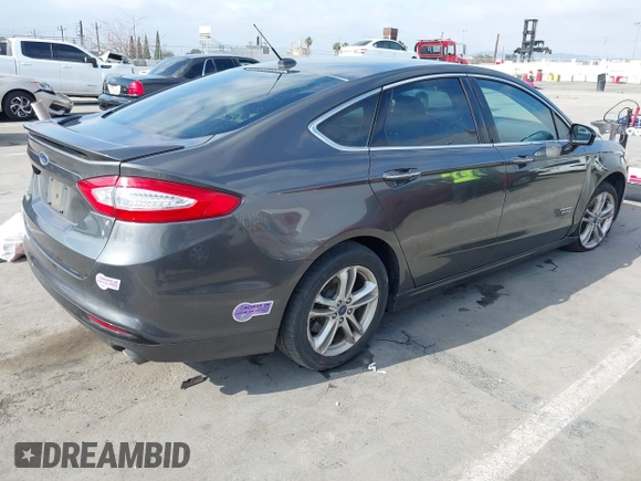 2016 Ford Fusion Titanium with VIN 3FA6P0SU9GR145186, listed as a IAAI auction lot 42023484 with 84,399 mi miles and . Bid and sale history available at DreamBid. Image 4.