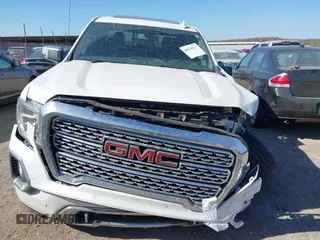 2020 GMC Sierra 1500 Denali with VIN 3GTU9FET8LG287861, listed as a IAAI auction lot 40678227 with 155,333 mi miles and . Bid and sale history available at carsss.com. Image 12.