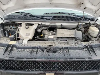 2015 Chevrolet Express Cargo z VIN 1GCZGUCG4F1264179, wystawiony jako Copart lot #58852475 z przebiegiem 294 776 mil mil oraz Czysty tytuł • Clean title. Historia ofert i sprzedaży dostępna na DreamBid. Obrazek 12.