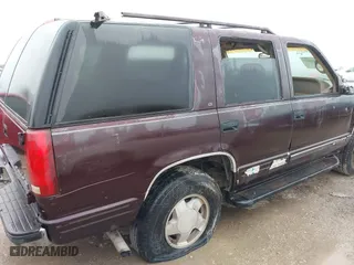 1997 Chevrolet Tahoe with VIN 1GNEK13R8VJ329165, listed as a IAAI auction lot 41631672 with 166,976 mi miles. Bid and sale history available at carsss.com. Image 6.