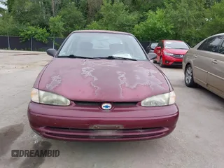 1998 Chevrolet Prizm Lsi z VIN 1Y1SK528XWZ423879, wystawiony jako IAAI lot #42522200 z przebiegiem 171 445 mil mil oraz . Historia ofert i sprzedaży dostępna na DreamBid. Obrazek 6.