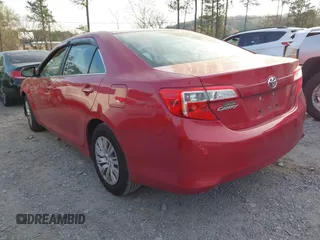 2014 Toyota Camry L with VIN 4T1BF1FK3EU770985, listed as a IAAI auction lot 41896125 with 146,100 mi miles. Bid and sale history available at carsss.com. Image 3.