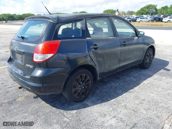 2003 Toyota Matrix Std with VIN 2T1KR32E63C116953, listed as a IAAI auction lot 41929877 with 299,999 mi miles. Bid and sale history available at carsss.com. Image 4.