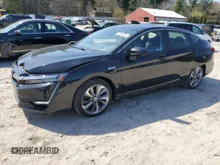 2018 Honda Clarity Touring z VIN JHMZC5F34JC017430, wystawiony jako Copart lot #54500635 z przebiegiem 91 013 mil mil oraz Szkoda całkowita • Salvage title. Historia ofert i sprzedaży dostępna na DreamBid. Obrazek 1.