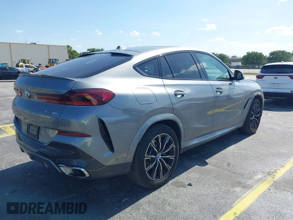 2025 BMW X6 xDrive40i z VIN 5UX33EX04S9X20728, wystawiony jako IAAI lot #42192580 z przebiegiem 22 906 mil mil oraz . Historia ofert i sprzedaży dostępna na DreamBid. Obrazek 4.