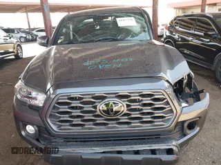 2022 Toyota Tacoma SR z VIN 3TYCZ5AN1NT062445, wystawiony jako IAAI lot #41967336 z przebiegiem Nie podano mil oraz . Historia ofert i sprzedaży dostępna na DreamBid. Obrazek 10.