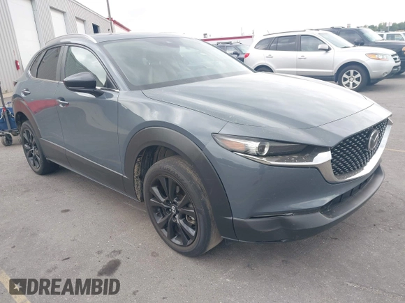 2022 Mazda CX-30 S Carbon Edition with VIN 3MVDMBCL6NM431985, listed as a IAAI auction lot 42610558 with Not provided miles and . Bid and sale history available at DreamBid. Image 1.