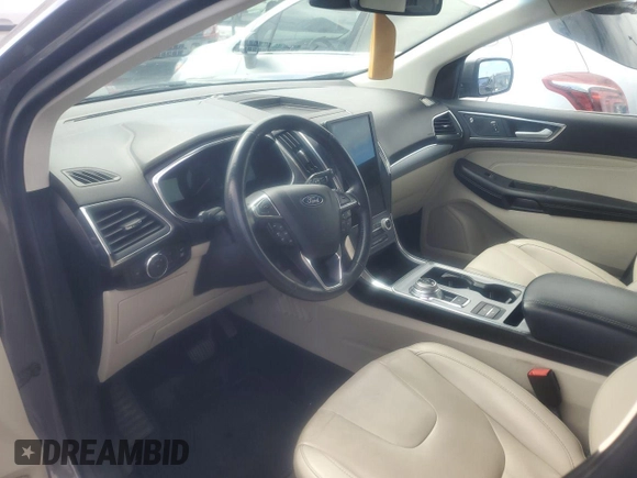 2021 Ford Edge Titanium z VIN 2FMPK3K92MBA53689, wystawiony jako IAAI lot #42501151 z przebiegiem 93 941 mil mil oraz . Historia ofert i sprzedaży dostępna na DreamBid. Obrazek 21.