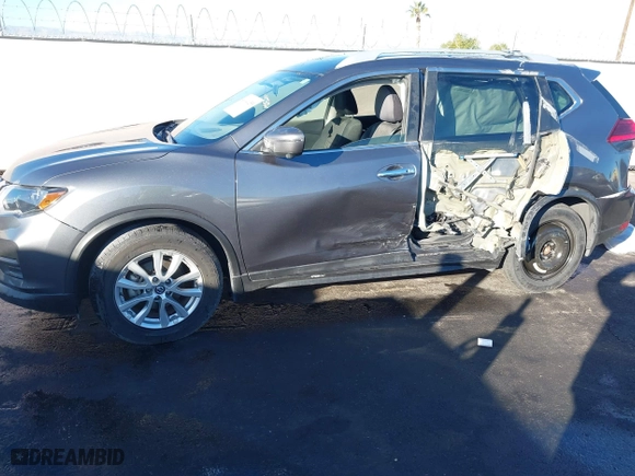 2017 Nissan Rogue SL with VIN 5N1AT2MT7HC767765, listed as a IAAI auction lot 41141255 with 143,584 mi miles. Bid and sale history available at carsss.com. Image 6.