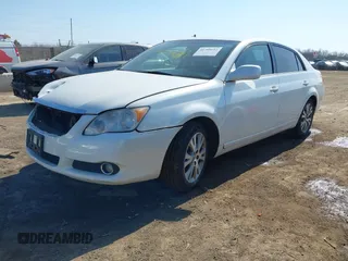 2008 Toyota Avalon XL with VIN 4T1BK36B08U274604, listed as a IAAI auction lot 41768642 with 180,335 mi miles. Bid and sale history available at carsss.com. Image 2.