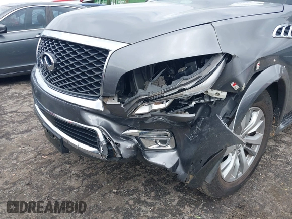 2017 Infiniti QX80 with VIN JN8AZ2NE1H9151466, listed as a IAAI auction lot 41813407 with 82,428 mi miles. Bid and sale history available at carsss.com. Image 6.