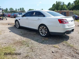 2014 Ford Taurus Limited with VIN 1FAHP2F8XEG181491, listed as a IAAI auction lot 40277144 with 107,374 mi miles. Bid and sale history available at carsss.com. Image 3.