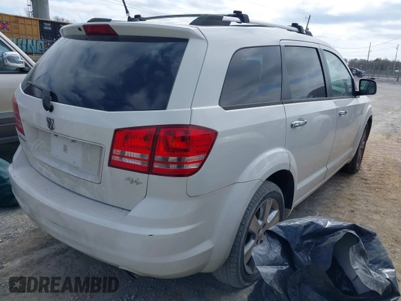 2009 Dodge Journey R/T with VIN 3D4GH67V99T169786, listed as a IAAI auction lot 41708329 with 131,556 mi miles and . Bid and sale history available at DreamBid. Image 4.