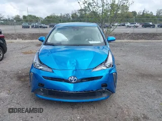 2022 Toyota Prius L Eco with VIN JTDKAMFU5N3165006, listed as a IAAI auction lot 41753470 with 33,567 mi miles and . Bid and sale history available at DreamBid. Image 12.