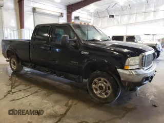 2002 Ford F-350 XL z VIN 1FTSW31F92EC17984, wystawiony jako Copart lot #55821575 z przebiegiem 346 645 mil mil oraz Szkoda całkowita • Salvage title. Historia ofert i sprzedaży dostępna na DreamBid. Obrazek 4.