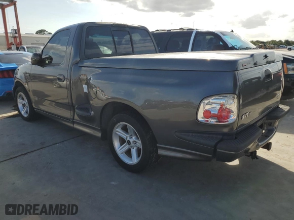 2003 Ford F-150 Lightning with VIN 2FTRF07303CA45572, listed as a Copart auction lot 74384694 with 0 mi miles and Salvage Title. Bid and sale history available at carsss.com. Image 2.