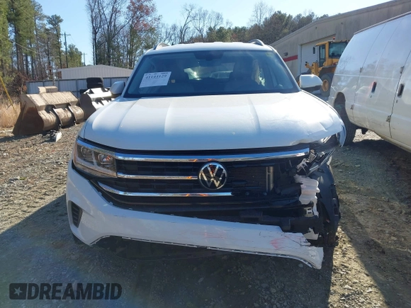 2023 Volkswagen Atlas SE with VIN 1V2DP2CA0PC544616, listed as a IAAI auction lot 41144129 with 23,099 mi miles and . Bid and sale history available at DreamBid. Image 12.