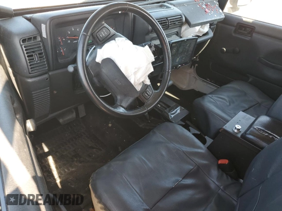 2003 Jeep Wrangler X with VIN 1J4FA39S13P311214, listed as a Copart auction lot 57345175 with 75,088 mi miles and Salvage title. Bid and sale history available at DreamBid. Image 8.