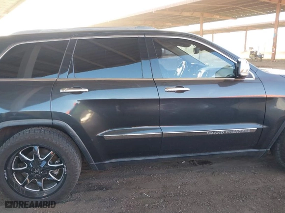 2011 Jeep Grand Cherokee Overland with VIN 1J4RR6GT1BC541506, listed as a IAAI auction lot 41850203 with 177,287 mi miles. Bid and sale history available at carsss.com. Image 13.