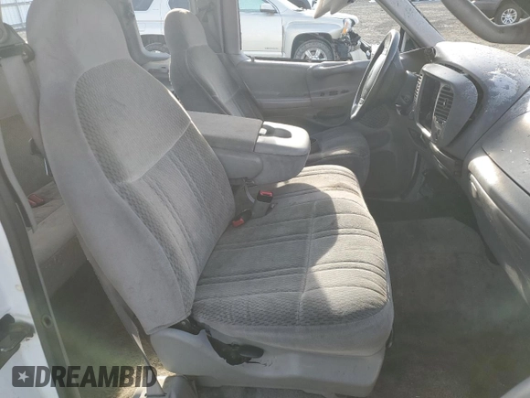 1997 Ford F-150 XL with VIN 1FTDX1869VKA43999, listed as a Copart auction lot 42239815 with 145,238 mi miles and Salvage Title. Bid and sale history available at carsss.com. Image 7.