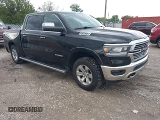 2019 Ram 1500 Laramie with VIN 1C6SRFJT3KN609963, listed as a IAAI auction lot 42317042 with 132,345 mi miles and . Bid and sale history available at DreamBid. Image 1.