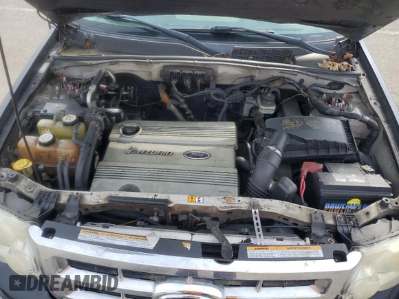2008 Ford Escape Hybrid with VIN 1FMCU59H98KE68957, listed as a Copart auction lot 55472005 with 303,719 mi miles and Clean title. Bid and sale history available at DreamBid. Image 12.