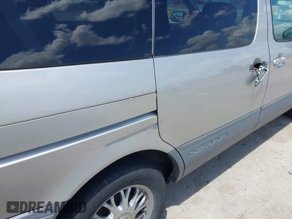 2003 Toyota Sienna CE z VIN 4T3ZF19C53U508778, wystawiony jako IAAI lot #42086544 z przebiegiem 236 152 mil mil oraz . Historia ofert i sprzedaży dostępna na DreamBid. Obrazek 12.