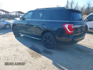 2021 Ford Expedition XLT with VIN 1FMJU1JT9MEA21621, listed as a IAAI auction lot 41458176 with 97,133 mi miles. Bid and sale history available at carsss.com. Image 3.